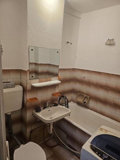Garsonieră decomandată în Titan