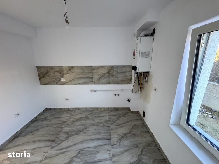 Casă cu 4 camere cu Teren 300 Mp în Bucium