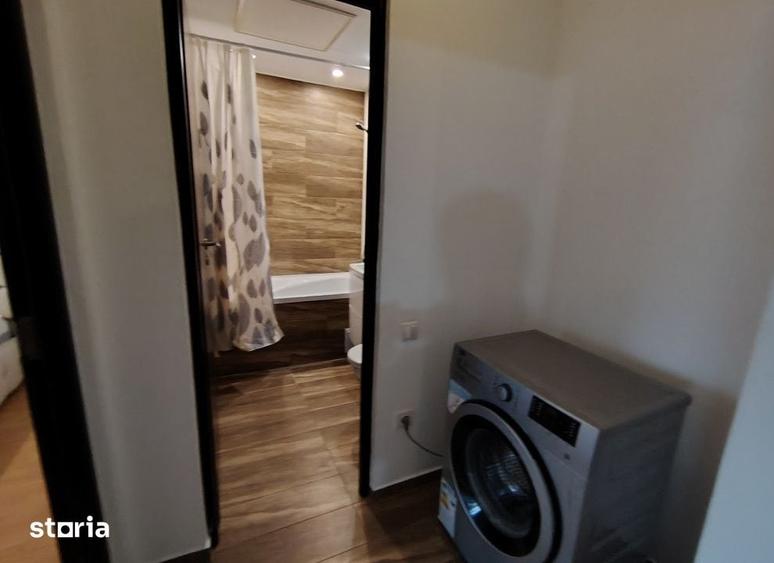 Apartament cu 3 camere semidecomandat în Podu Roș