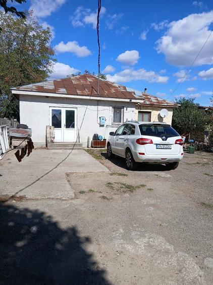 Casă cu Teren 1000 Mp în Bizighești