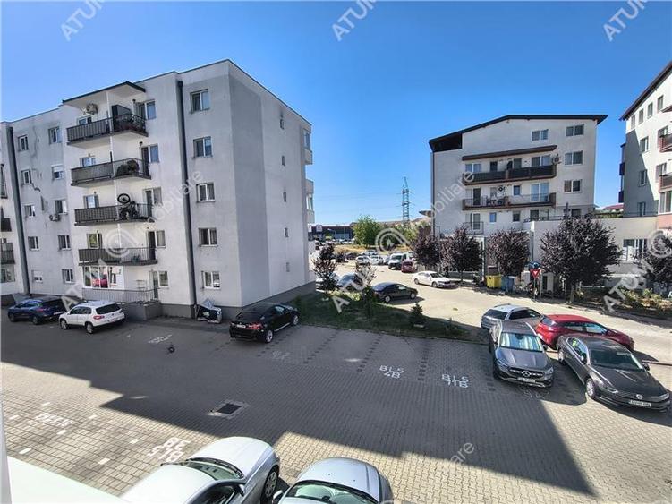 Apartament cu 2 camere decomandate balcon si loc de parcare etajul 1 - 18