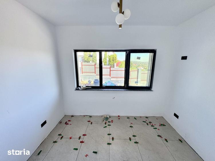 Casă cu 5 camere cu Teren 450 Mp în Bucium