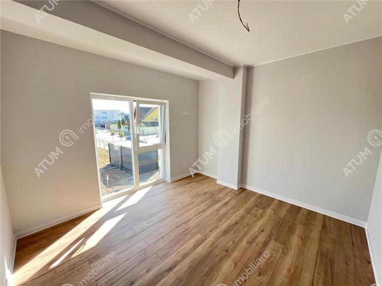 Apartament cu 3 camere decomandat în Șelimbăr — fotografia 2