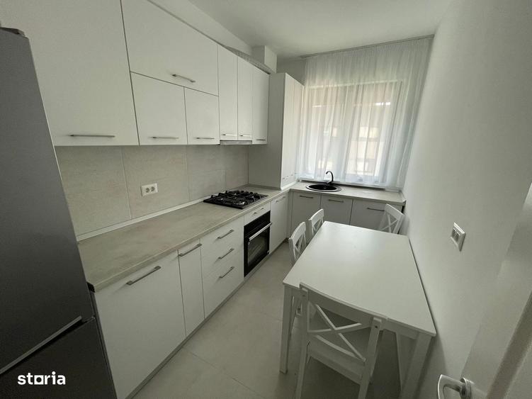 2 camere 54mp - etaj 8/10 - mobilat - loc parcare subteran - INTABULAT - 11