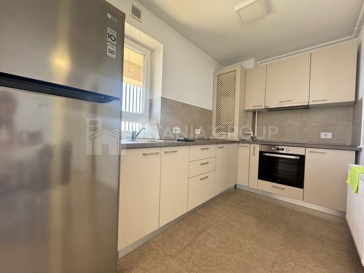 Apartament cu 2 camere semidecomandat, mobilat în Tractorul
