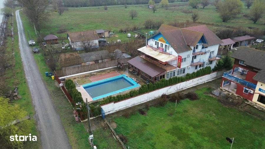 Casă cu Teren 2034 Mp în Maliuc