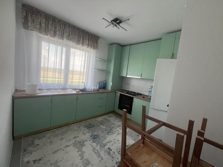 Apartament cu 2 camere decomandat în Petrești
