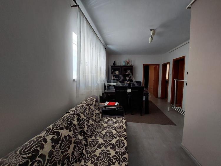 Apartament cu 3 camere semidecomandat, mobilat în Borhanci