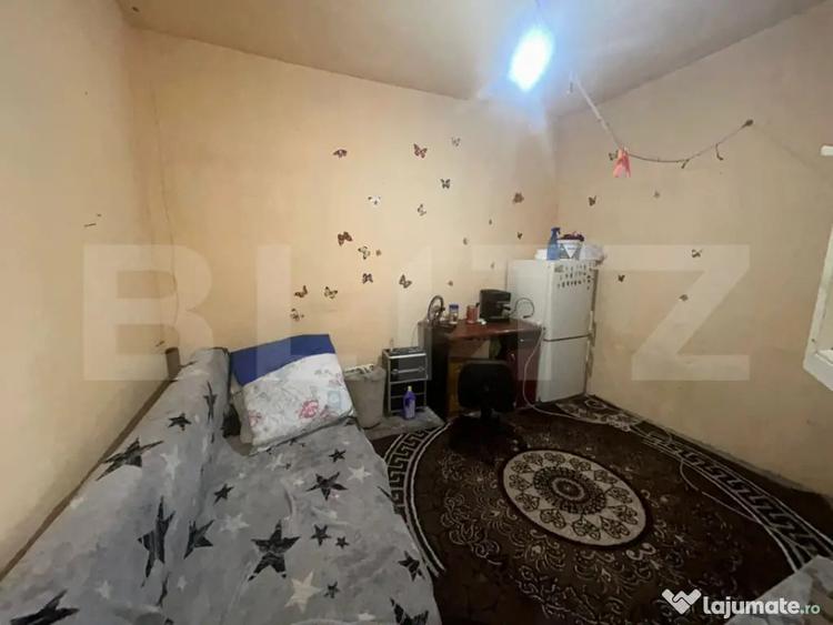 Casă cu 4 camere cu Teren 100 Mp în Central