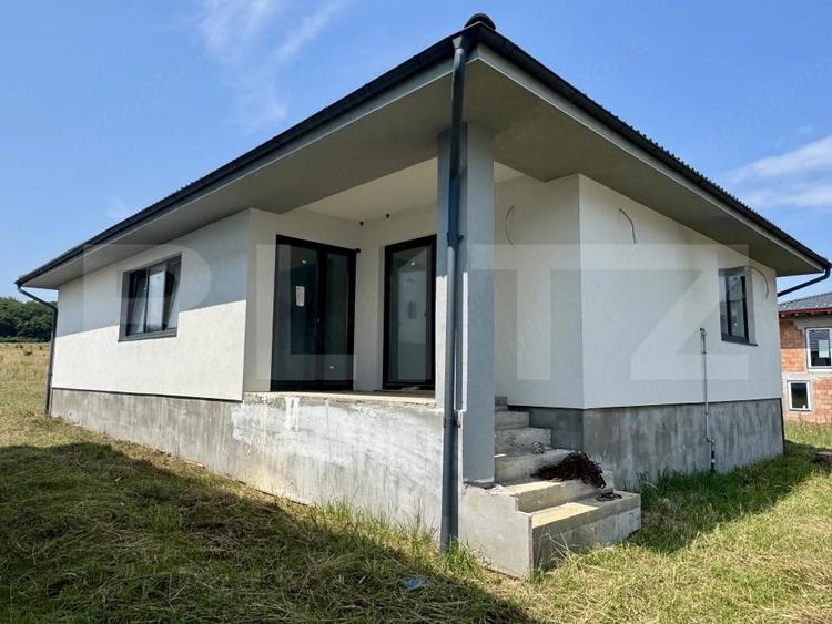 Casă cu Teren 528 Mp în Corunca