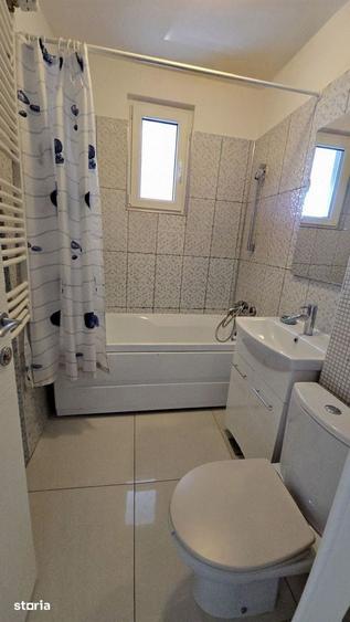 Apartament cu 3 camere semidecomandat, mobilat în Titan