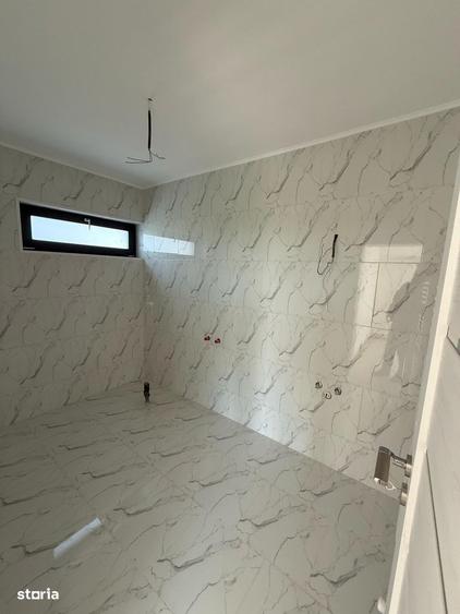 Casă cu 4 camere cu Teren 490 Mp în Păulești