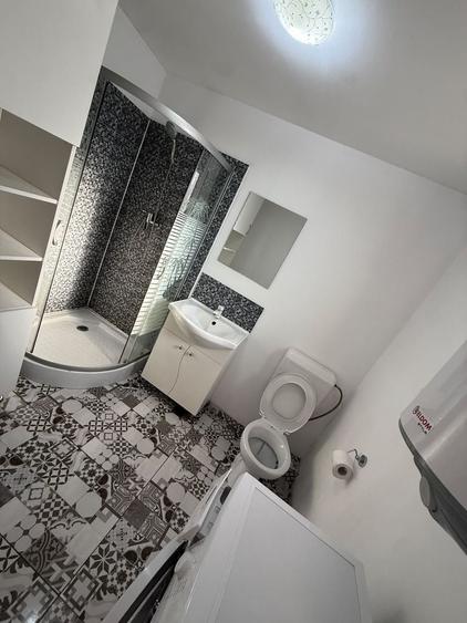 Casă cu 2 camere cu Teren 70 Mp în Central