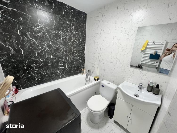 Casă cu 4 camere cu Teren 450 Mp în Tunari