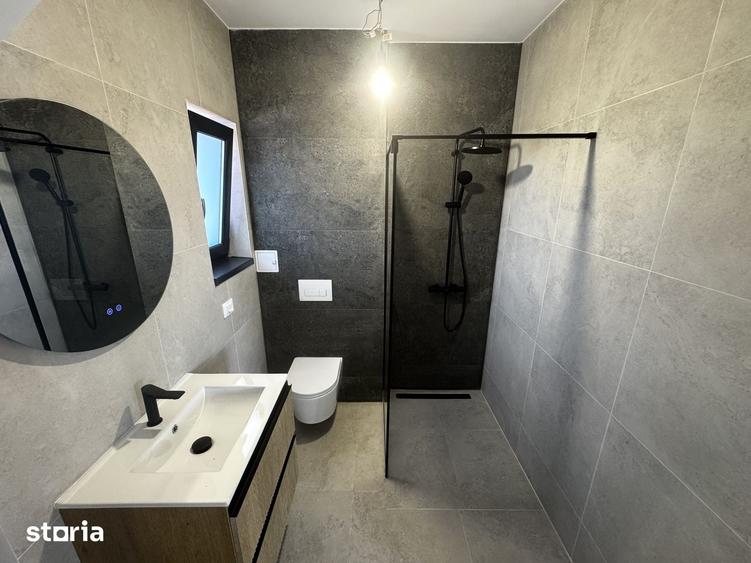 Casă cu 4 camere cu Teren 510 Mp în Holboca