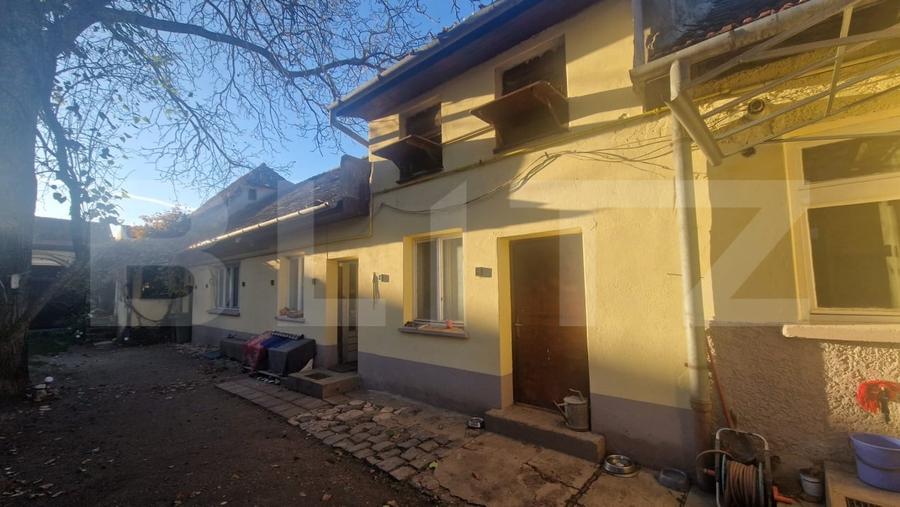 Casă individuală cu 6 camere cu Canalizare în Centrul Istoric
