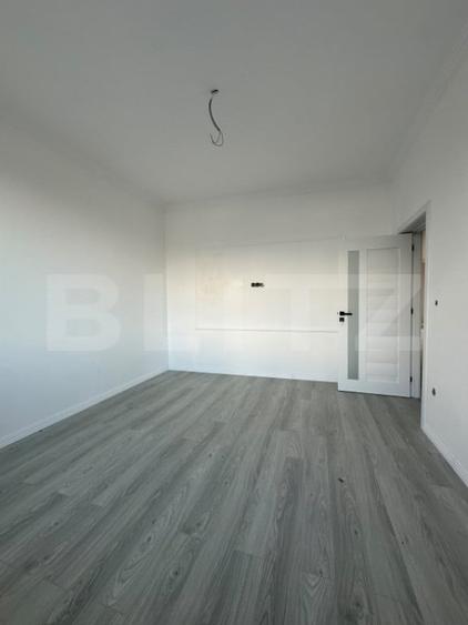 Casă cu 4 camere cu Teren 500 Mp în Central