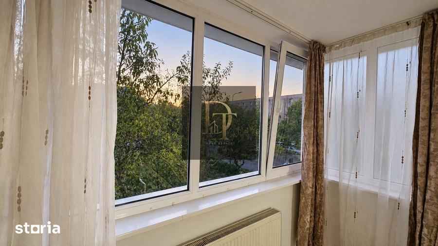 Apartament cu 3 camere decomandat în Tractorul