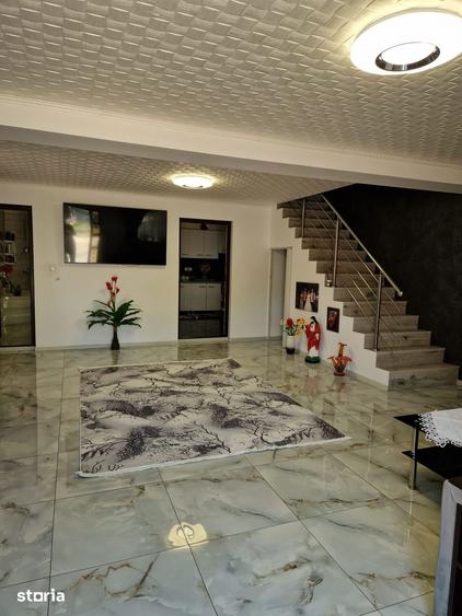 Casă cu 4 camere cu Teren 259 Mp în Comana