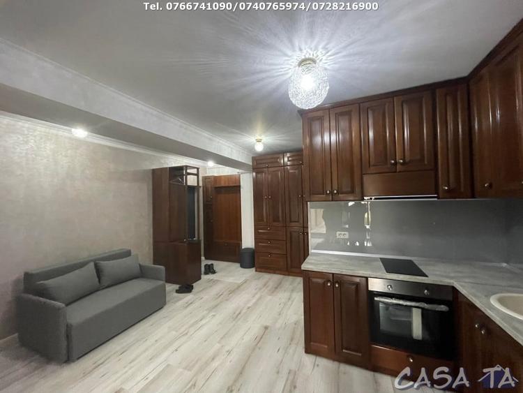 Apartament cu 2 camere semidecomandat, mobilat în Central