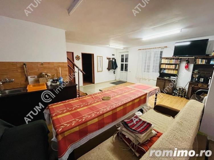 Casă cu 8 camere cu Teren 500 Mp în Paltin