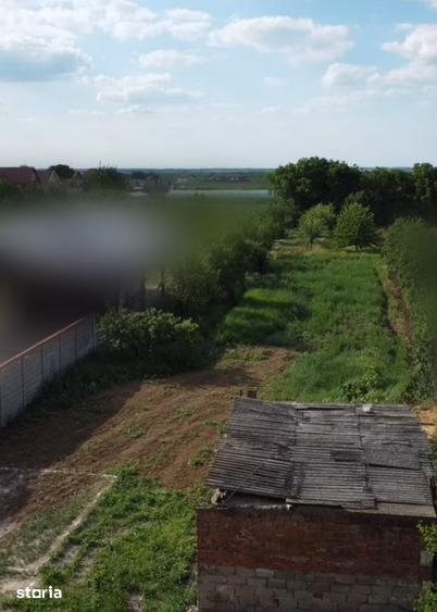 Casă cu 5 camere cu Teren 1000 Mp în Nojorid