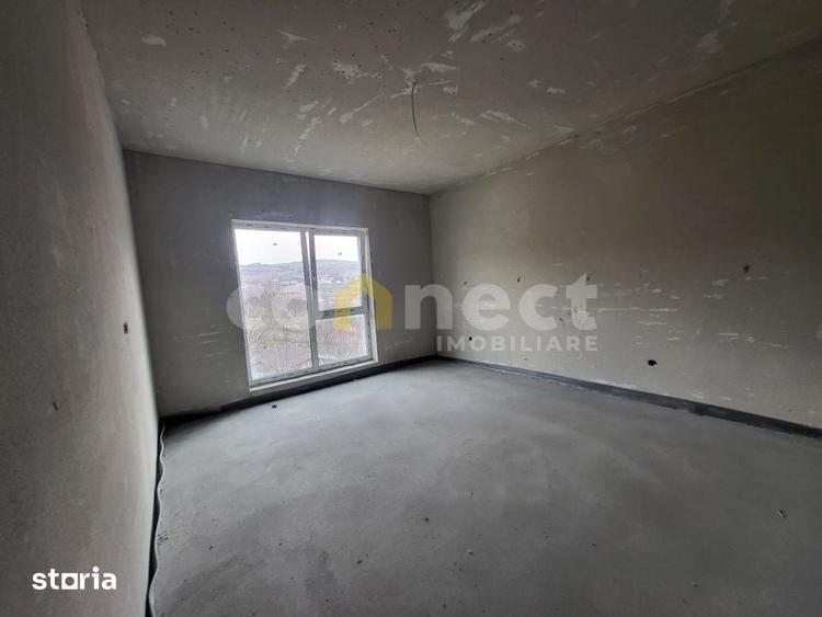 Casa individuala de vanzare | SU 113,7 mp | Teren 341 mp | Dezmir cu - 9