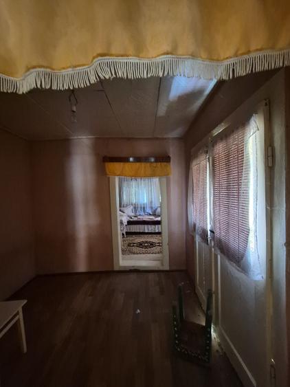 Casă cu 4 camere în Perișoru