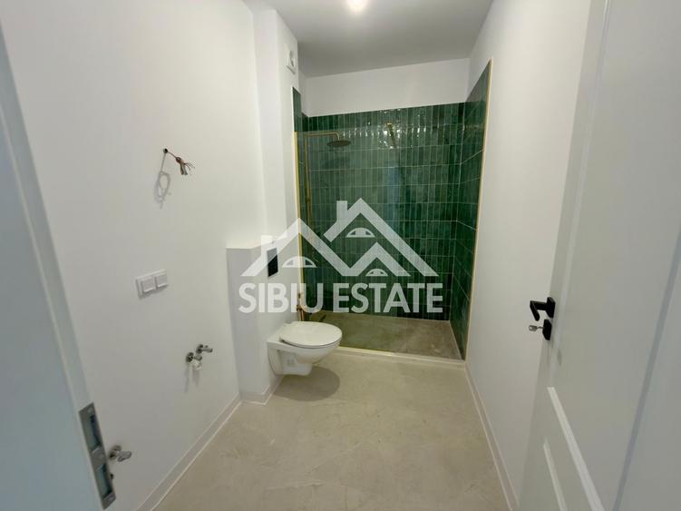 Apartament cu 3 camere decomandat în Șelimbăr — fotografia 2