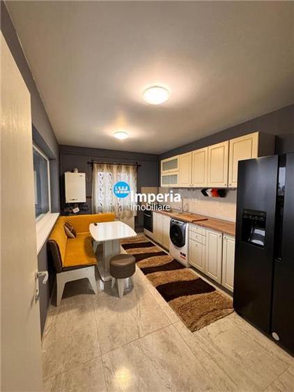 Apartament cu 4 camere decomandat, mobilat în Breazu
