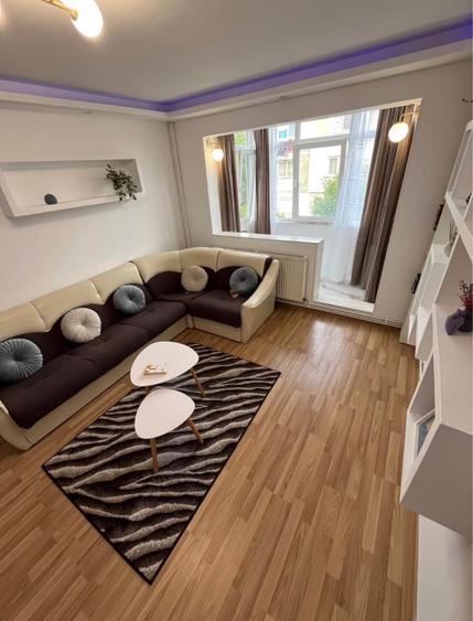 Apartament cu 2 camere semidecomandat, mobilat în Podu Roș