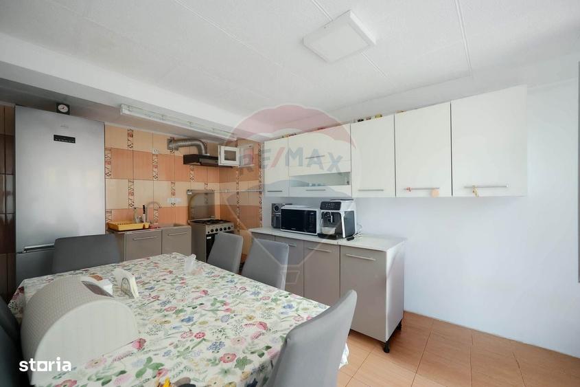 Casă cu 4 camere în Santăul Mic