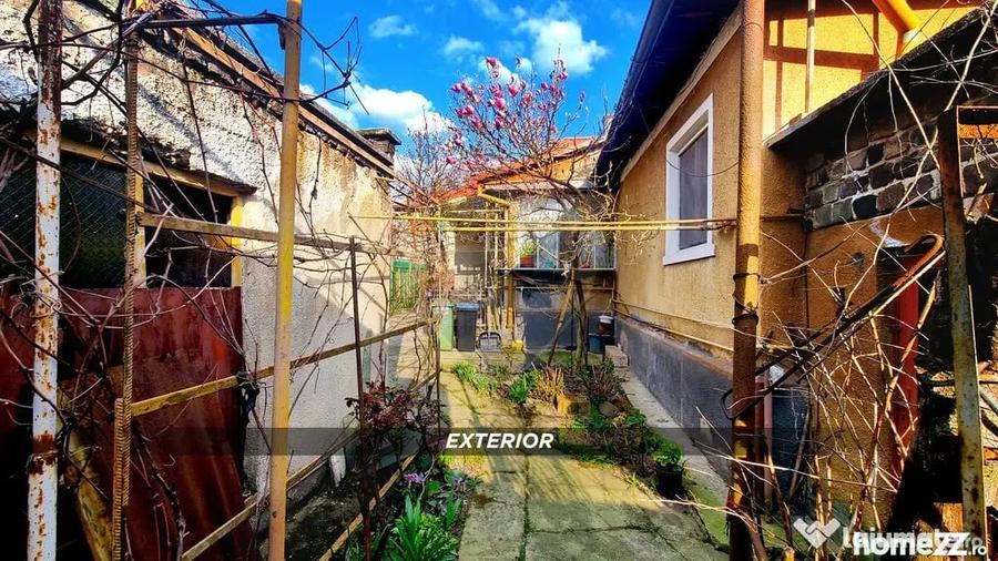 Casă cu 4 camere cu Teren 489 Mp în Central