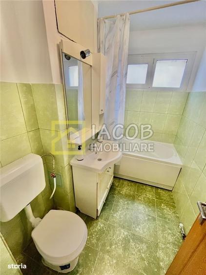 Apartament cu 2 camere semidecomandat, mobilat în Central