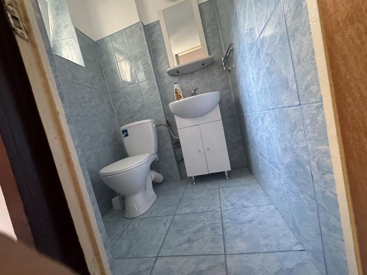 Apartament cu 3 camere decomandat în Calea București
