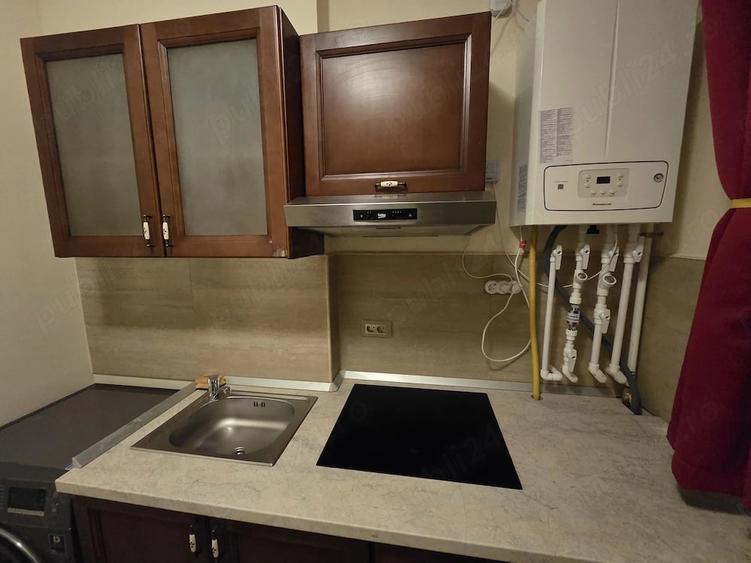 Apartament cu 4 camere decomandat în Central