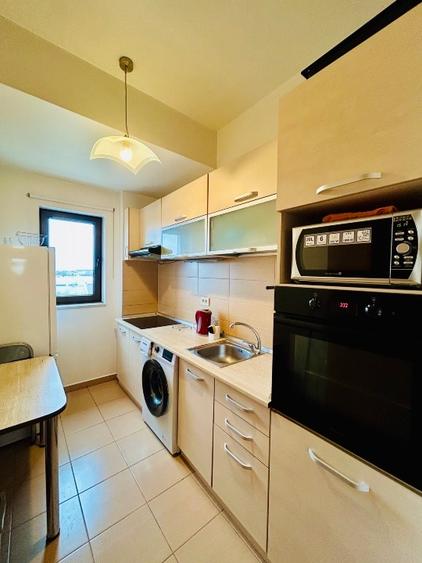 Apartament cu 2 camere semidecomandat, mobilat în Central