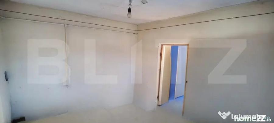 Casă cu 4 camere cu Teren 1000 Mp în Central