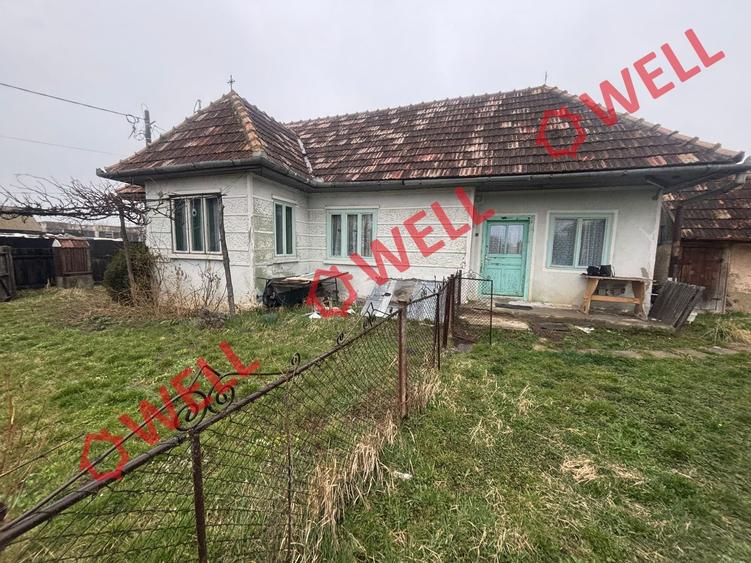 Casă cu 2 camere cu Teren 1189 Mp în Brețcu