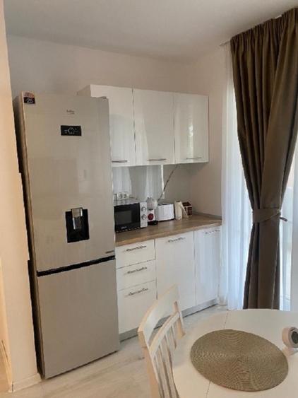 Apartament cu 2 camere semidecomandat, mobilat în Central