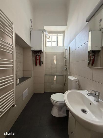 Apartament cu 2 camere semidecomandat în Chinteni