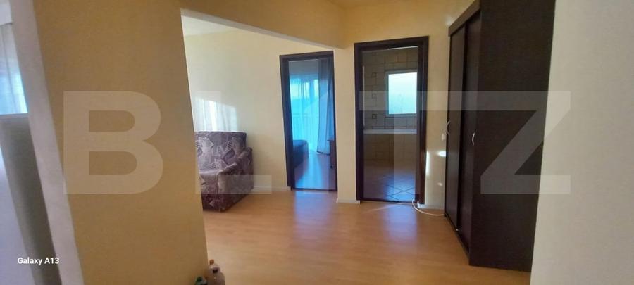 Apartament cu 2 camere semidecomandat, mobilat în Baciu