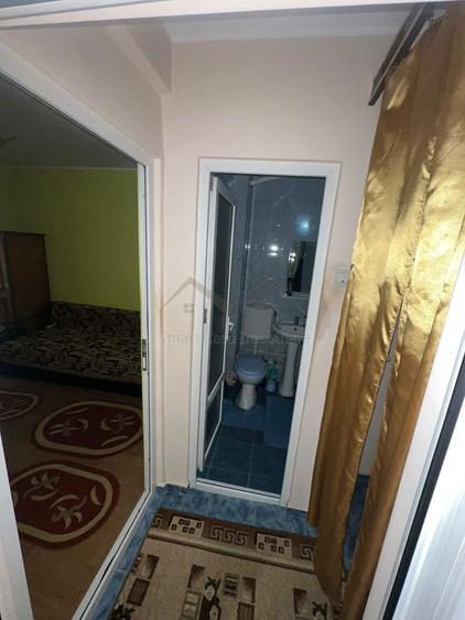 Apartament cu 2 camere semidecomandat în Podu Roș