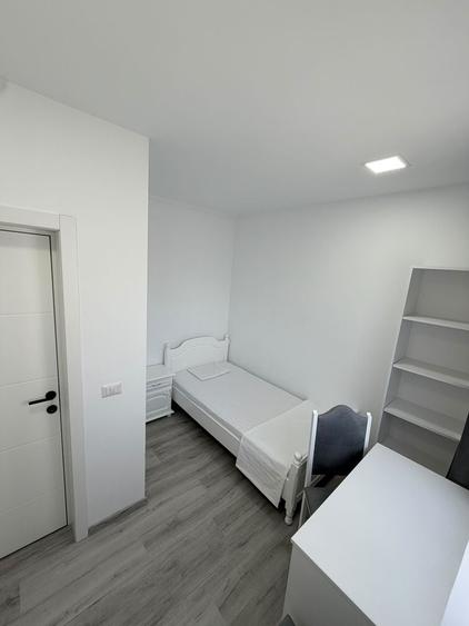 Casă cu 4 camere cu Teren 100 Mp în Central
