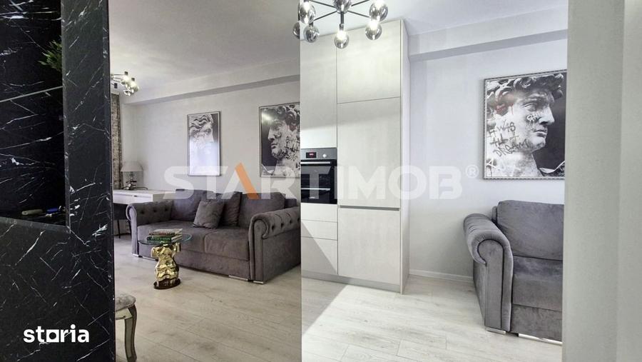 Apartament cu 2 camere, mobilat în Tractorul