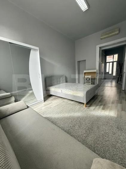 Apartament cu 2 camere semidecomandat, mobilat în Central