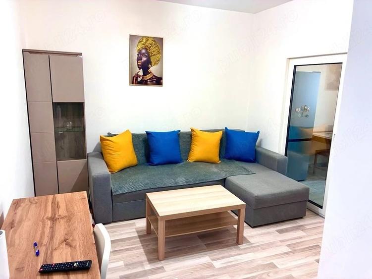 Apartament cu 2 camere semidecomandat, mobilat în Central