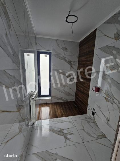 Casă cu 4 camere cu Teren 1000 Mp în Băiculești