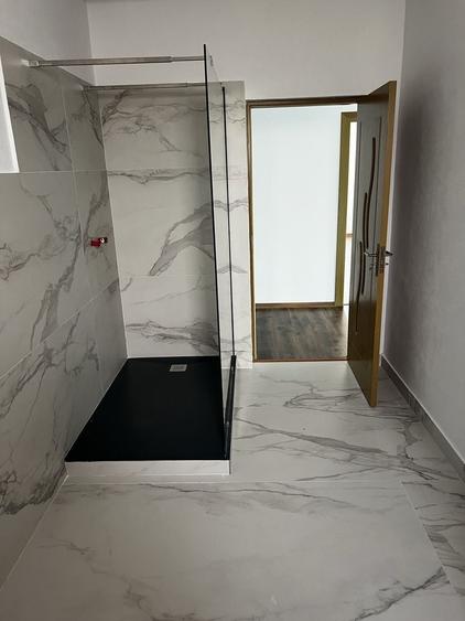 Casă cu 4 camere cu Teren 1000 Mp în Central