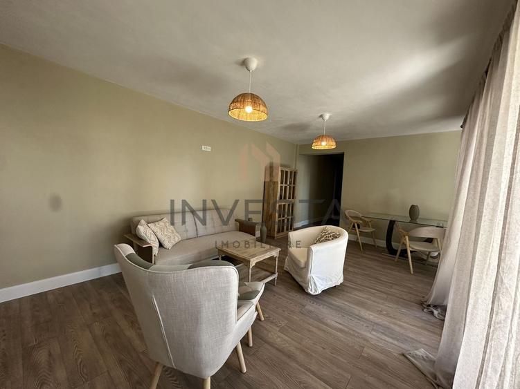 Apartament cu 3 camere semidecomandat, mobilat în Borhanci